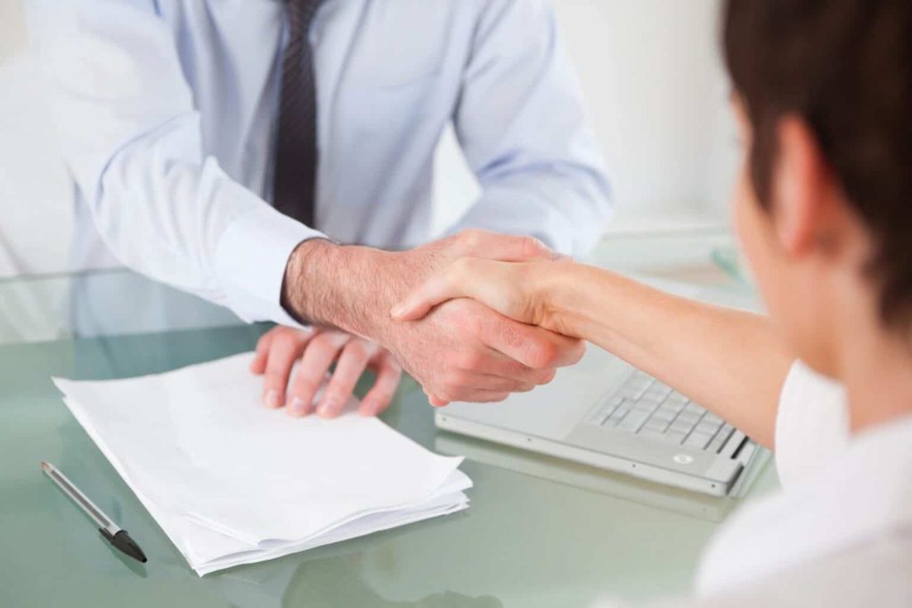 lawyer-shaking-hands-with-client